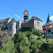 Hrad Loket nad městem, vedle kostel svatého Václava; skutečná archivní fotografie